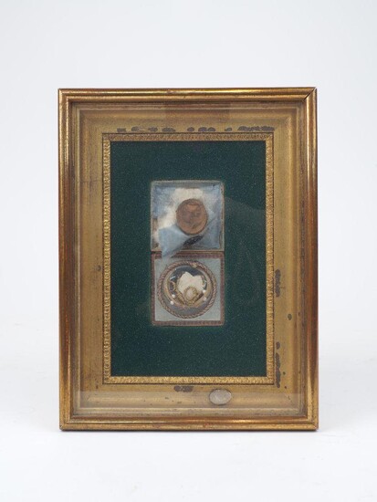 A framed lock of hair momento mori, dated 1832, threaded with pearls, above, a cameo of child, overall in a giltwood frame, 25 x 19cm