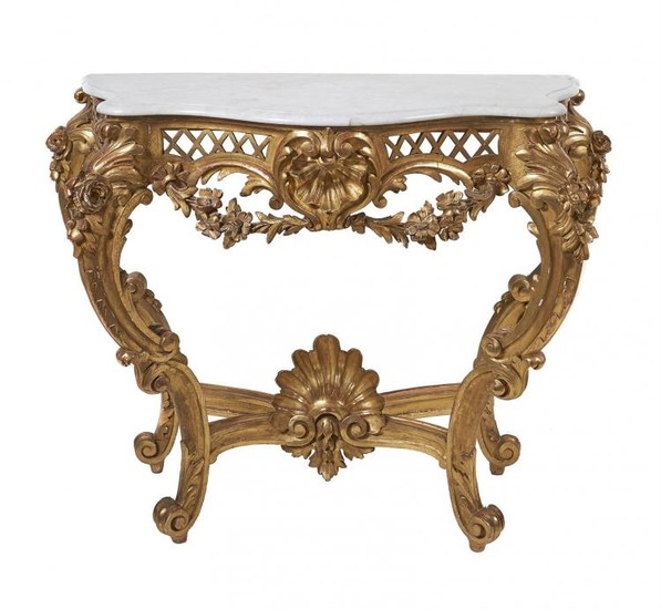 A giltwood console table in Louis XVI style