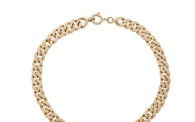 A gold curb-link bracelet
