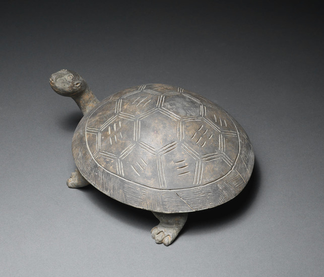 A grey pottery tortoise-shaped ink-stone and cover