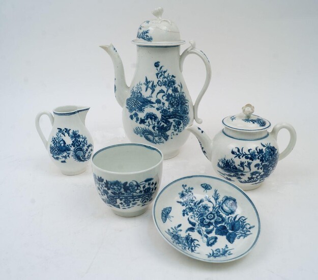 A group of Worcester blue and white porcelain, 18th century, to include: a baluster form coffee pot and cover, with scrolling handle and high thumb rest, decorated with a Chinoiserie garden scene with zig-zag fence and floral motifs, the cover with...