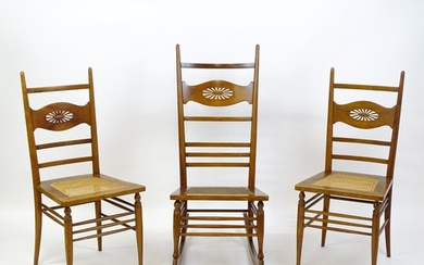 A group of three early 20thC Arts and Crafts style chairs co...
