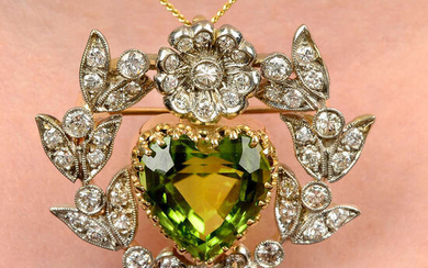 A heart-shape peridot and diamond floral wreath brooch.