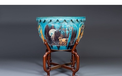 A large Chinese Fahua fish bowl with applied design of birds...