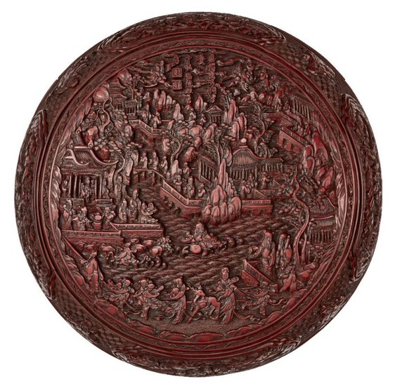 A large Chinese cinnabar lacquer circular box...