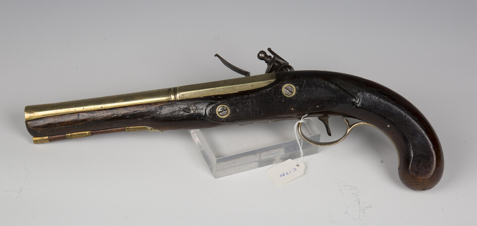 A late 18th/early 19th century flintlock pistol by Nicholson, London, with brass part-octagonal moul