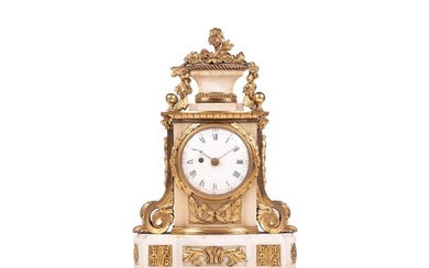 A late 19th century French white marble and gilt metal mante...