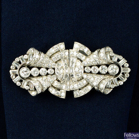 A mid 20th century brilliant, baguette and single-cut diamond double clip brooch.