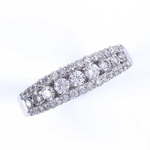 A modern 18ct white gold diamond cluster half eternity ring,...