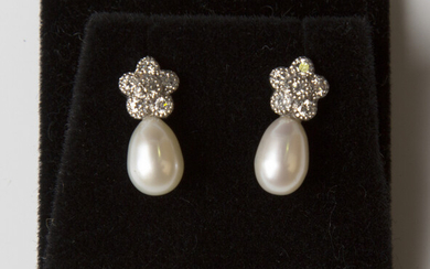 A pair of 18ct white gold, cultured pearl and diamond earrings, each mounted with a pear shaped cult