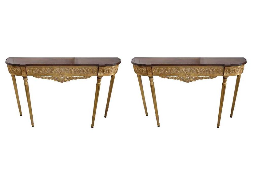 A pair of Adam style console tables