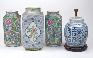 A pair of Chinese export square vases, late 20th century, the green ground decorated overall with flowers, exotic birds and butterflies, 32cm high; together with a Chinese export square vase, 20th century, the sides decorated with quatrefoil panels...