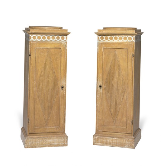 A pair of Gustavian style painted pedestal cabinets. 19th century and later. H. 137 cm. W. 50 cm. D. 48 cm. (2)