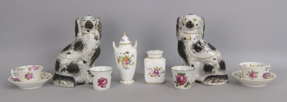 A pair of Staffordshire pottery spaniels, 19th...