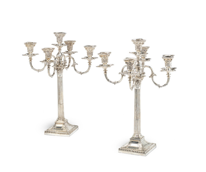 A pair of Victorian silver candelabra