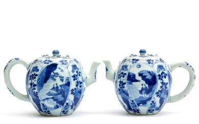A pair of blue and white 'lotus' teapots