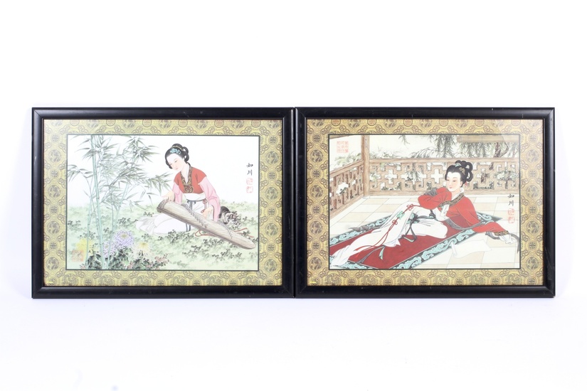 A pair of framed Chinese Republic style printed pictures on fabric. Each depicting a lady, the first reclining on a red rug on a terrace and the other playing a stringed instrument in a garden, each bearing two printed red seal and two character marks...