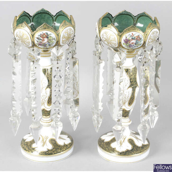 A pair of late 19th century overlaid and green lustre vases.