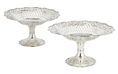 A pair of pierced Edwardian silver tazze dishes, Sheffield, c.1906, Atkin Brothers, each with pierced sides to shaped edge and raised on a shaped circular foot, 14cm high, total weight approx. 29.3oz (2)