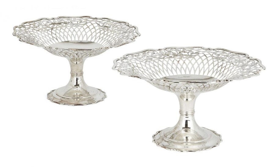 A pair of pierced Edwardian silver tazze dishes, Sheffield, c.1906, Atkin Brothers, each with pierced sides to shaped edge and raised on a shaped circular foot, 14cm high, total weight approx. 29.3oz (2)
