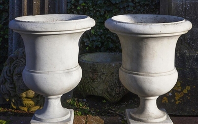 A pair of sculpted carrara marble campagna vases