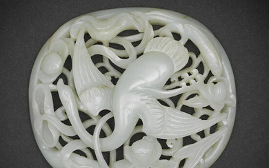 A pale green jade openwork 'Spring Water' oval plaque