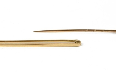 A plain gold bar brooch