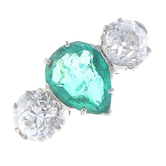 A platinum Colombian emerald and diamond three-stone