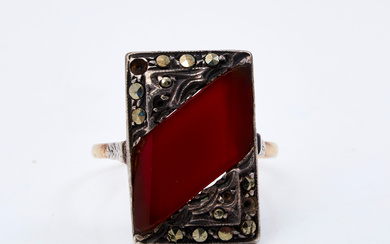 A ring, 18k gold and silver, cut carnelian and marcasites, mid 20th century, Swedish import stamp.