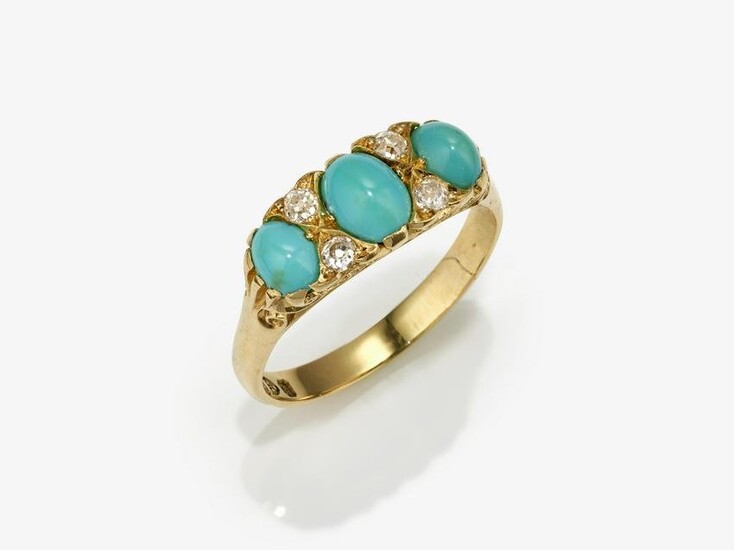 A ring with diamonds and turquoises