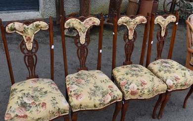 A set of four late Victorian upholstered dining chairs having mahogany frame