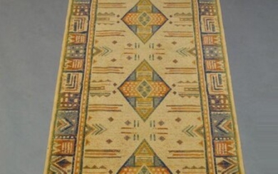 A silk runner, late 20th Century, with four diamond lozenges...