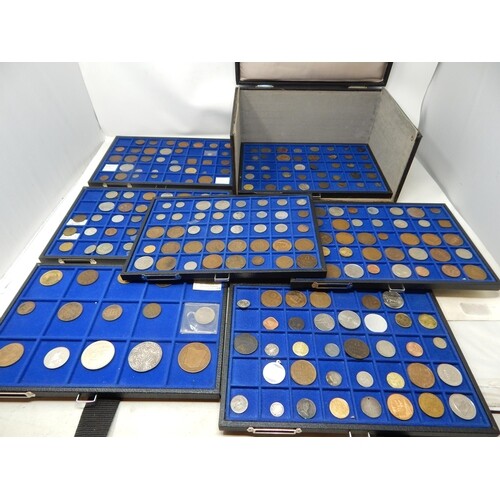 A vintage Coin Collectors case containing 7 trays of World c...