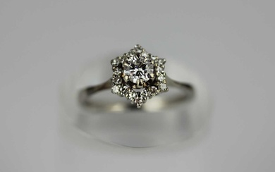 A white gold and diamond cluster ring