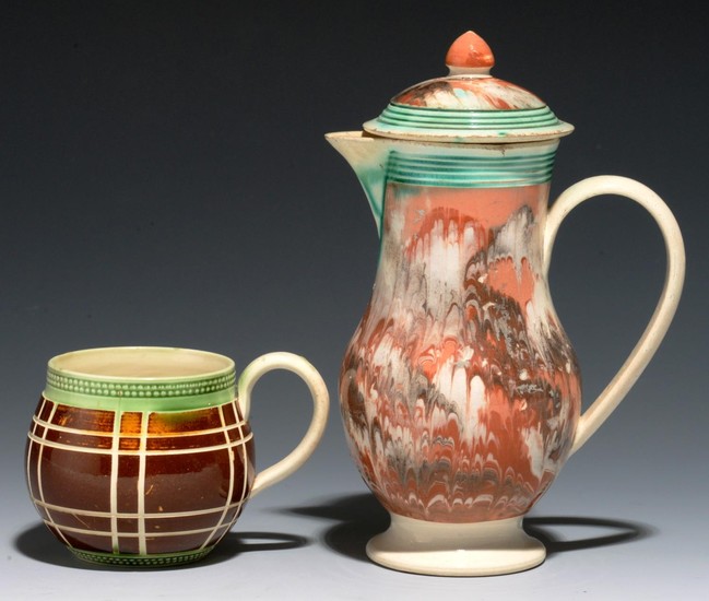 AN EARLY COMBED SLIP BALUSTER JUG AND COVER, C1790 with reed...