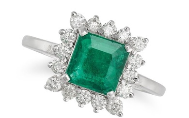 AN EMERALD AND DIAMOND CLUSTER RING set with an octagonal step cut emerald of approximately 1.37