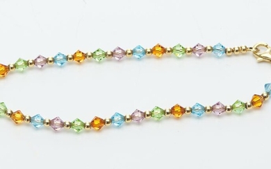 AN ITALIAN COLOURED FACETED BEAD BRACELET IN 9CT GOLD, LENGTH 180MM