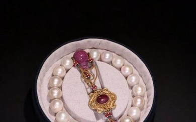 AN OLD PEARL BEADS STRING BRACELET