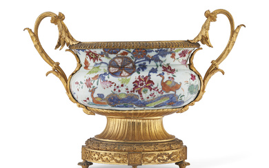 AN ORMOLU-MOUNTED CHINESE EXPORT PORCELAIN ' PSEUDO TOBACCO LEAF' CENTERPIECE...