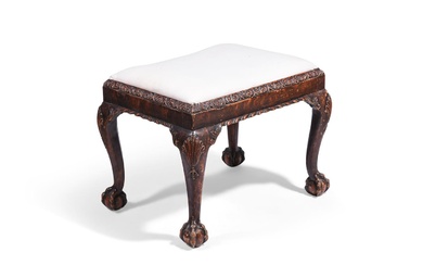 AN UNUSUAL 'GRAINED' AND CARVED WOOD STOOL, LATE 19TH OR EARLY 20TH CENTURY