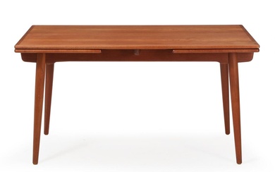 “AT 312”. A teak dining table with extension. Manufactured and marked by...
