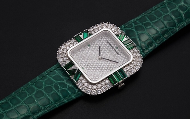 AUDEMARS PIGUET, A LADIES WHITE GOLD WRISTWATCH SET WITH DIAMONDS AND EMERALDS AND A PAVED DIAL
