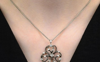 An 18ct gold brilliant-cut diamond stylised clover