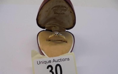 An 18ct gold diamond set ring, size L, 2 grams.