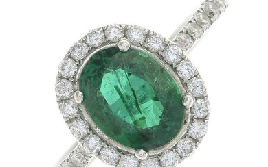 An 18ct gold emerald and brilliant-cut diamond dress ring.