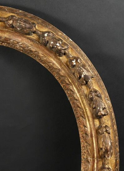 An 18th Century Carved Oval Frame, 22" x 18.75" - 56cm