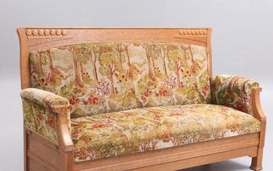 An Art Nouveau sofa with folding armrests, early 20th century.