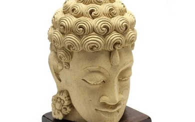 An Asian Carved Stone Buddha Head