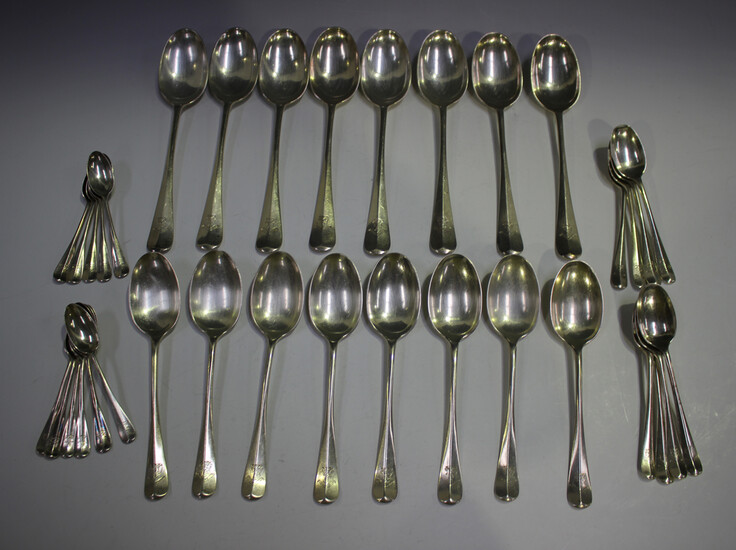 An Edwardian part canteen of silver Hanoverian Rat Tail cutlery, comprising eight table forks and sp