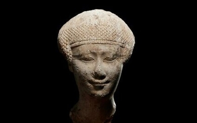 An Egyptian Limestone Head of a Noblewoman Height 4
